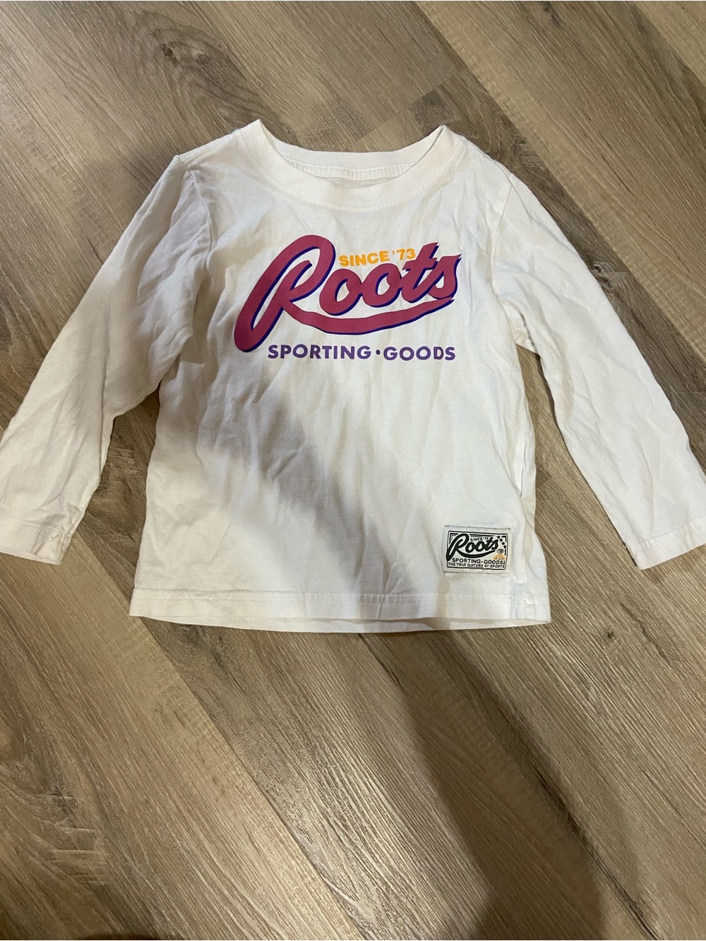 Roots White Long-Sleeve Tee with Pink & Purple Logo